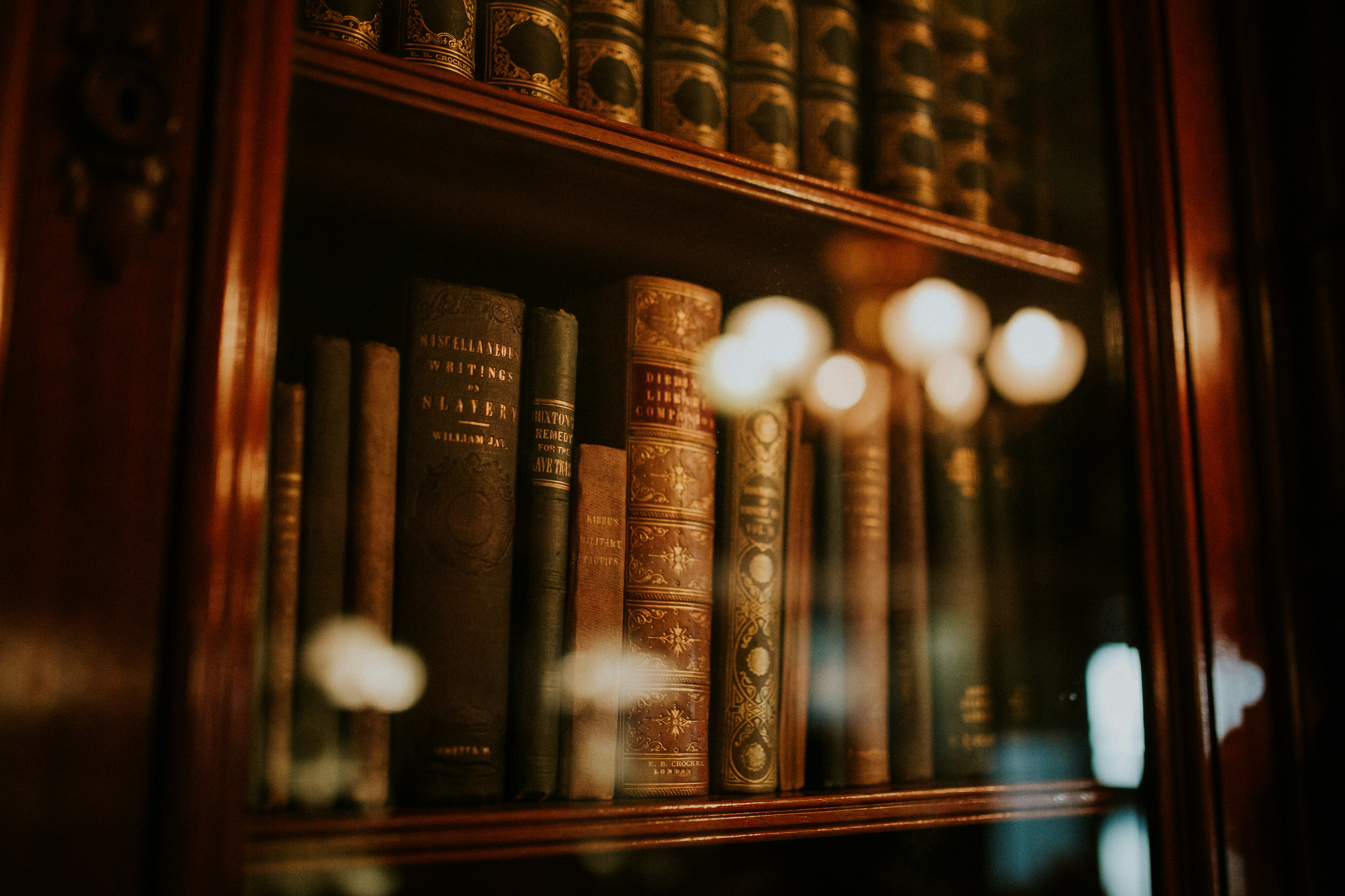 Classic legal books in a library cabinet